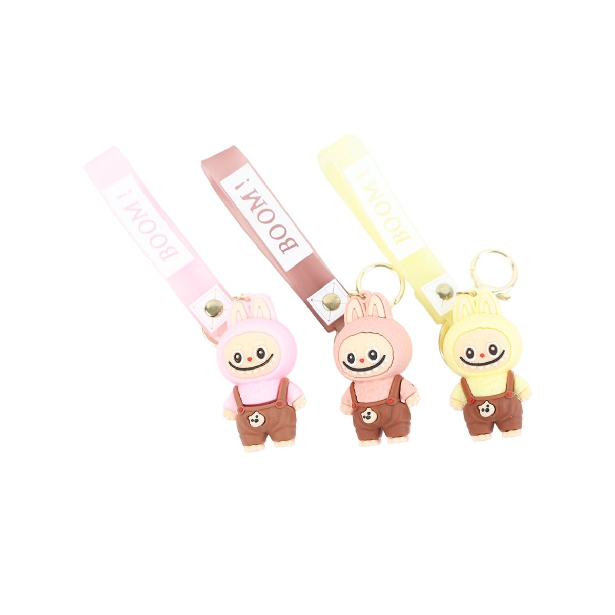 Keychain with cartoon character charm on pastel straps, gold key rings