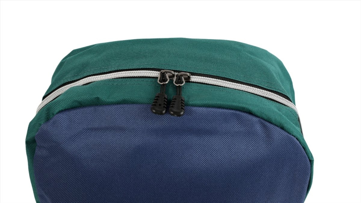 Kids backpack top in green with zipper track and black pull tabs.