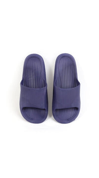 Kids deep purple slide slippers with slip-on open back and cushioned footbed.