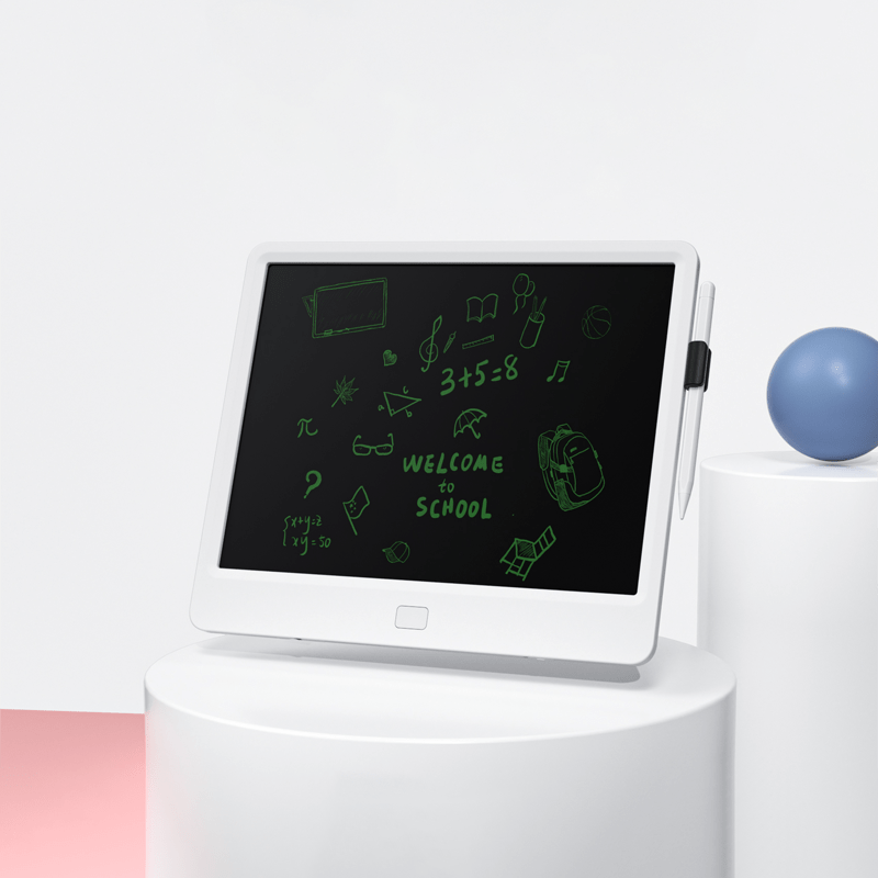 Kids electronic writing pad showing school-themed doodles on dark screen