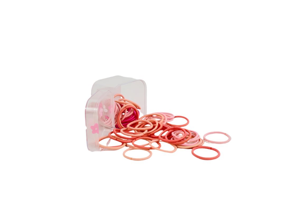 Peach soft hair ties with flower charms, shown spilling out of a clear storage box