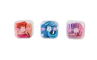 Three soft hair tie sets in clear plastic boxes: pink, blue, and purple with charms