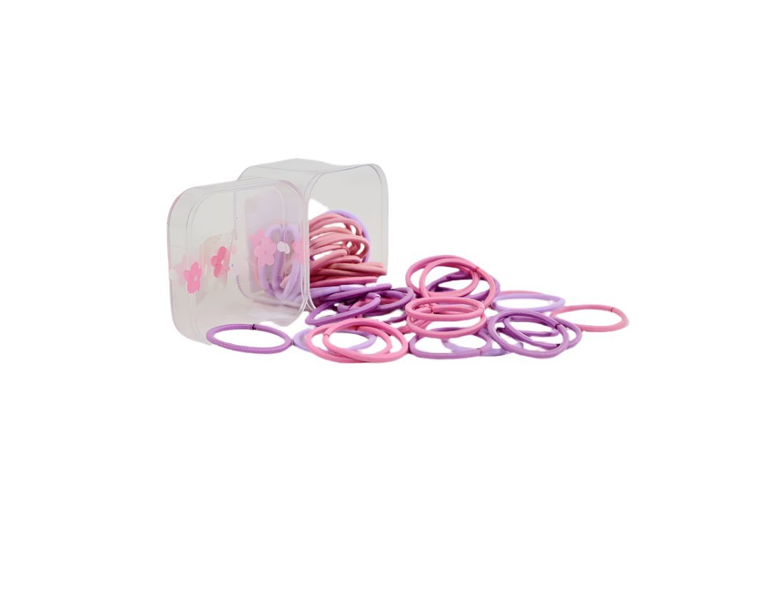 Pink and purple soft hair ties with flower charms in a clear storage box