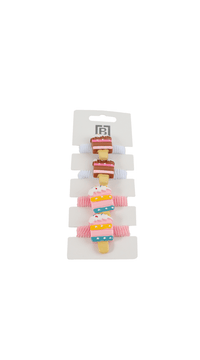 Pack of four cake-shaped hair ties on elastic bands with frosting decorations