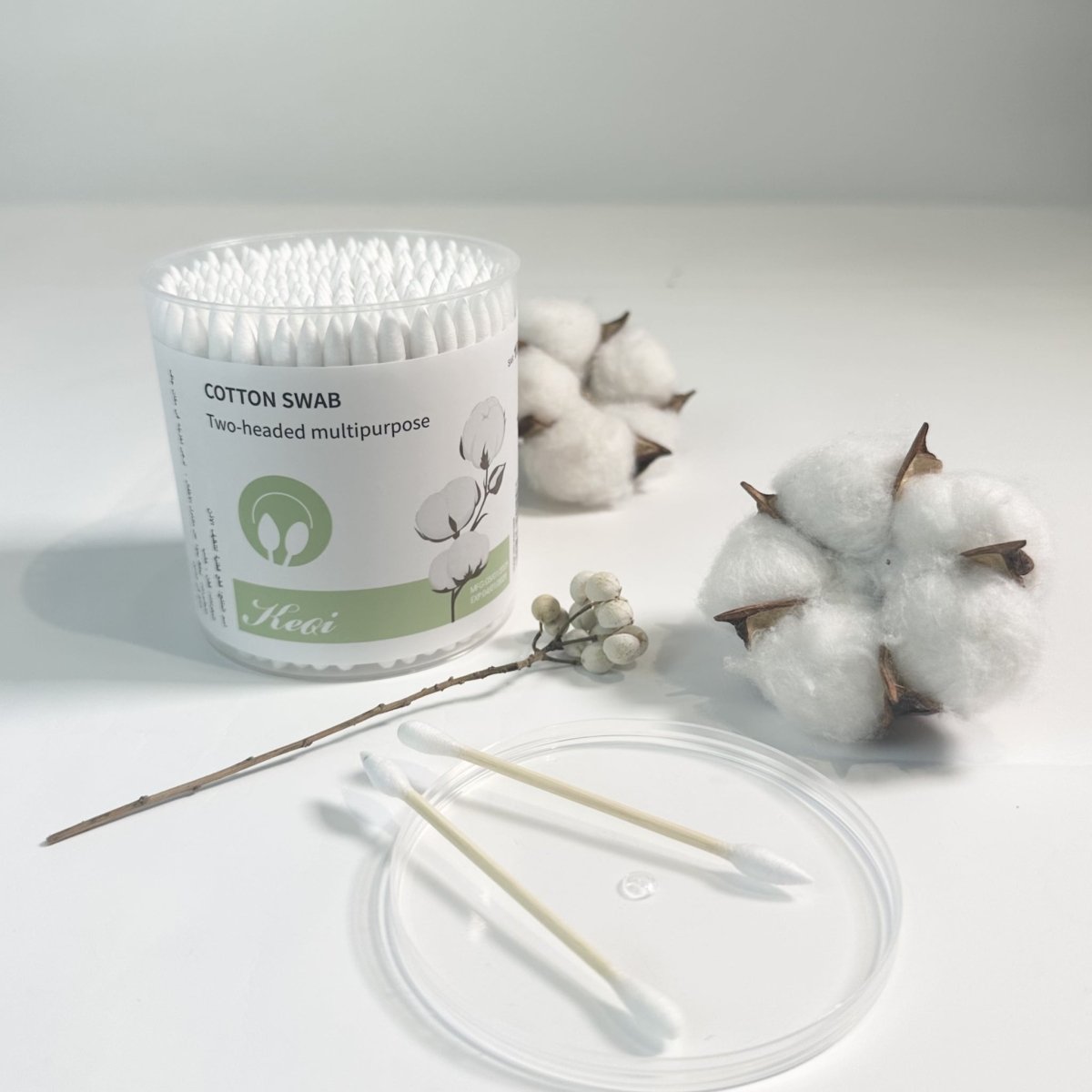 Double-headed cotton swab pack with white swabs and plastic jar container