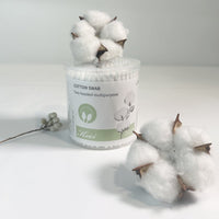 Double-headed cotton swab jar with loose white cotton swabs