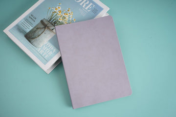 Lavender velvet notebook with simple lined pages, closed cover