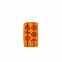 Orange silicone ice tray with bottle-shaped molds and red ice-cube forms