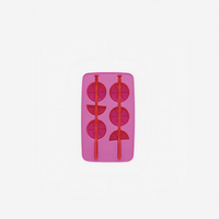 Pink silicone ice tray with bottle-shaped molds and dark pink ice-cube forms