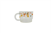 Kids glass cup with fruits and carrot-style icons print, wide handle, white base
