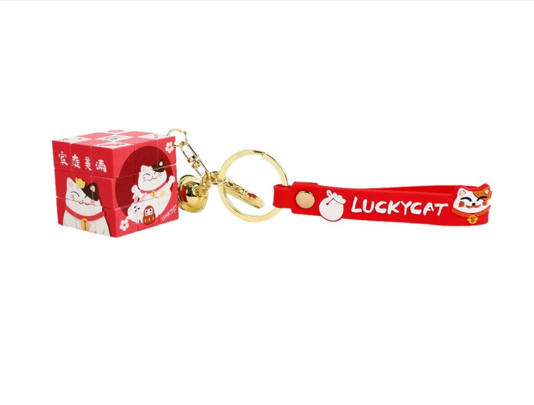 Lucky Cat Rubik's Cube series keychain with red strap and cube charm, gold clasp