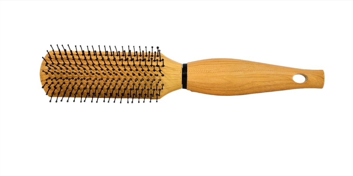 Wooden paddle hair brush with long handle and black-tipped pins across the head
