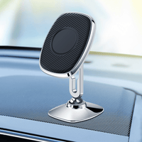 Magnetic car phone mount with black grip pad on a chrome stand for dashboards
