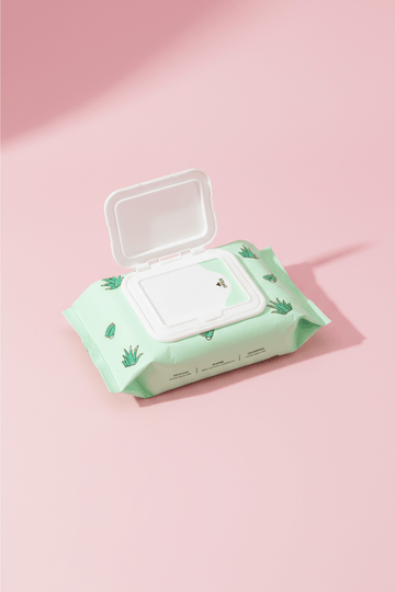 Makeup remover wipes pack with open lid, mint-green aloe leaf pattern