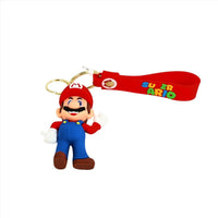 Red wrist-strap keychain with Mario PVC charm and gold keyring, cartoon design