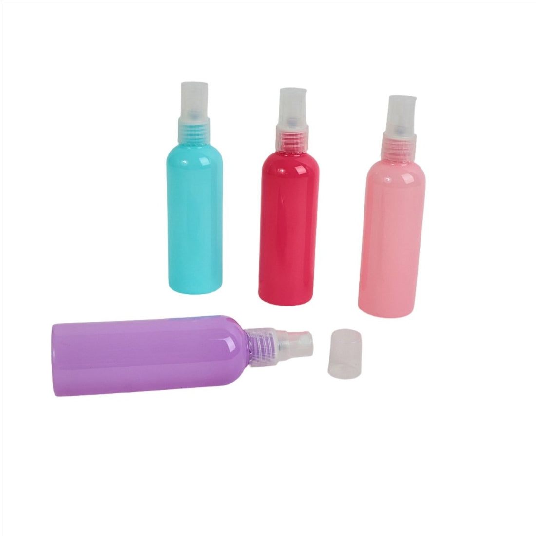 Travel bottle kit: turquoise, red, pink bottles with purple bottle and caps