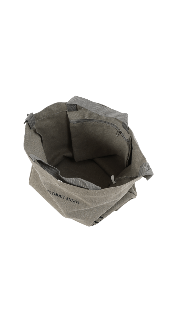 Gray canvas tote bag interior view with open top and top handles.