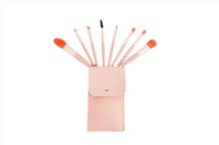 Pink makeup brush set in a standing pouch, 8 brushes fanned out