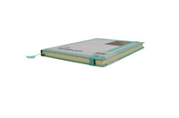 A5 soft-cover notebook, teal cover with layered spine and elastic strap.