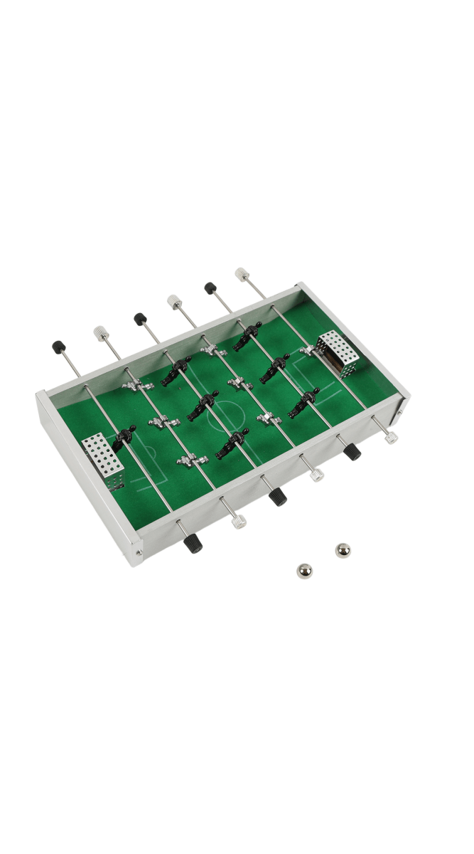 Mini desktop soccer game table, angled view with green pitch, rods, black-and-white players
