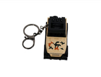 Mini Jeep keychain in beige with camo patches and key ring, front view.