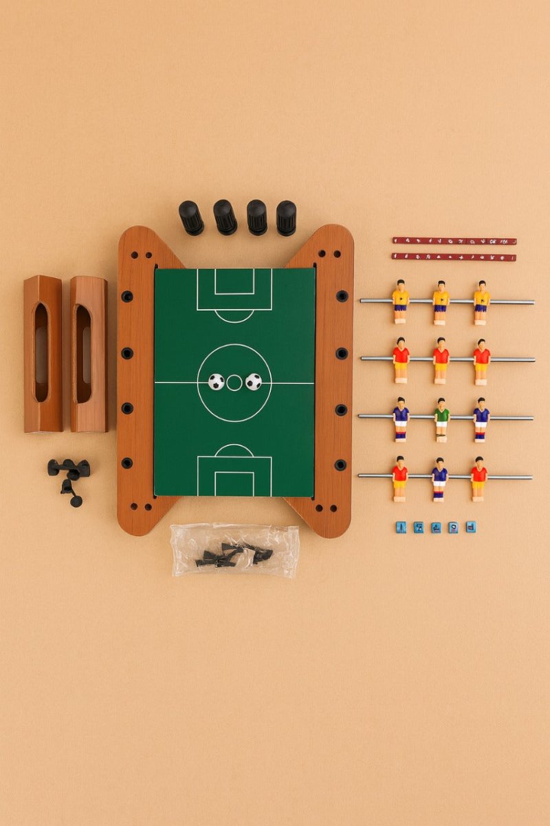 Mini tabletop football game set with green field, foosball players and rods
