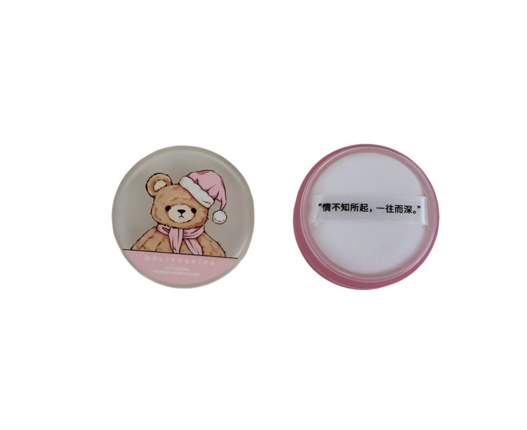 Round makeup loose powder compact showing lid front and smooth underside