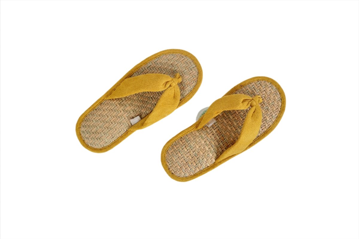 Mustard woven slippers with fabric knot bow on instep, slip-on design