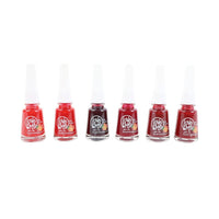 Set of Love Me nail polish bottles in red, dark red, and black shades.