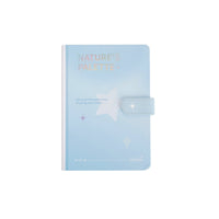 Pastel blue notebook with magnetic buckle and Nature’s Palette star design