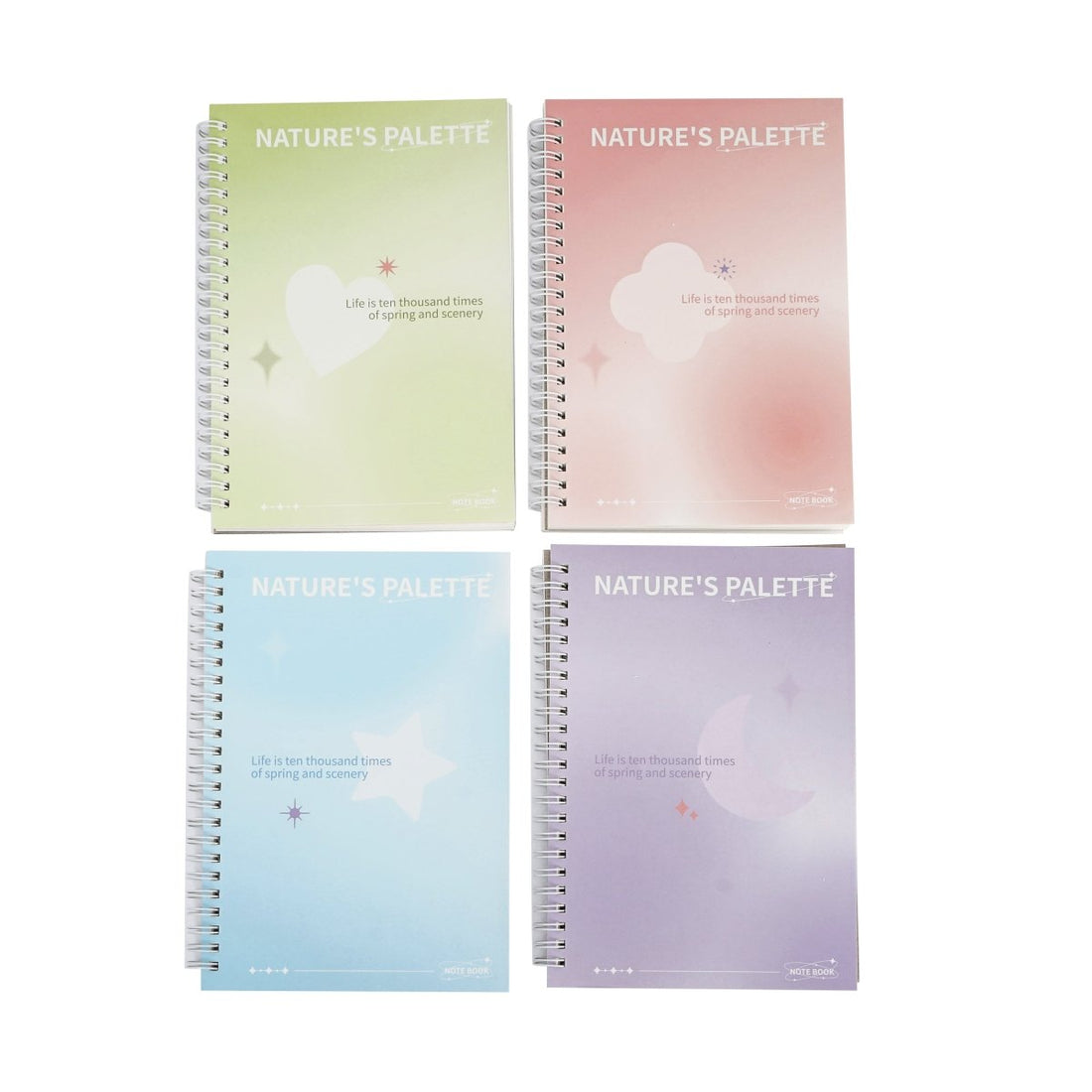 Set of four A5 pastel coil notebooks in green, pink, blue, and purple.