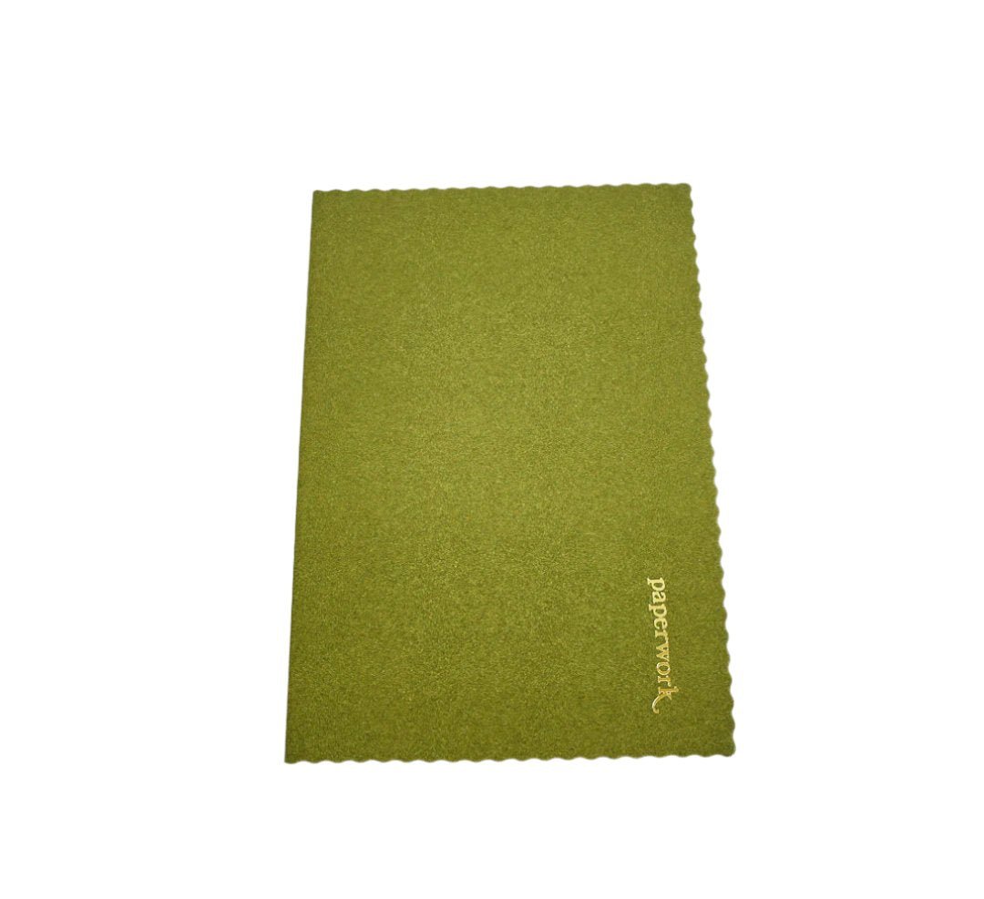 Olive green wavy coil notebook with textured cover and small branding