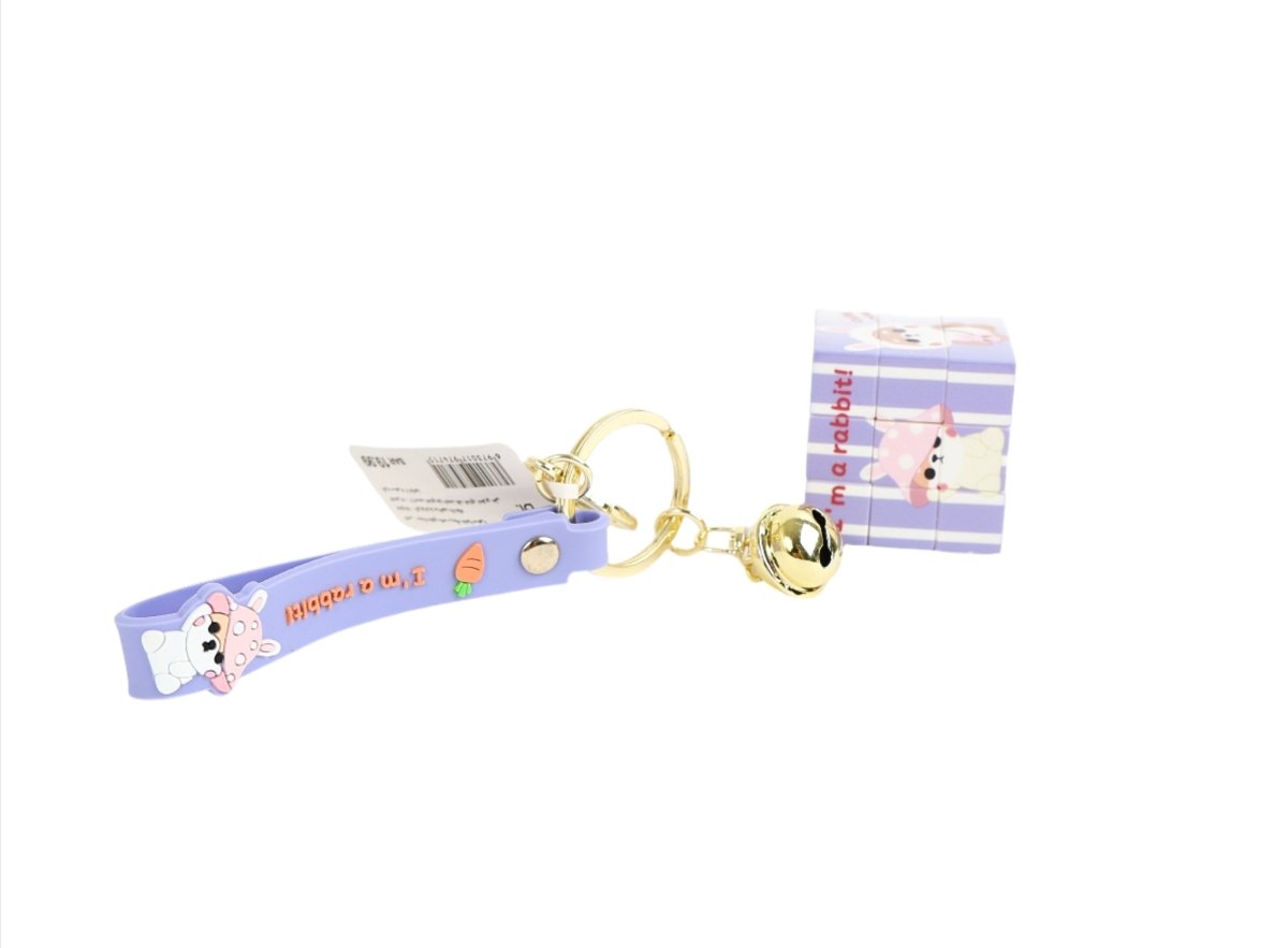 Blue fabric keychain strap with bunny tag charm, gold ring, and bell