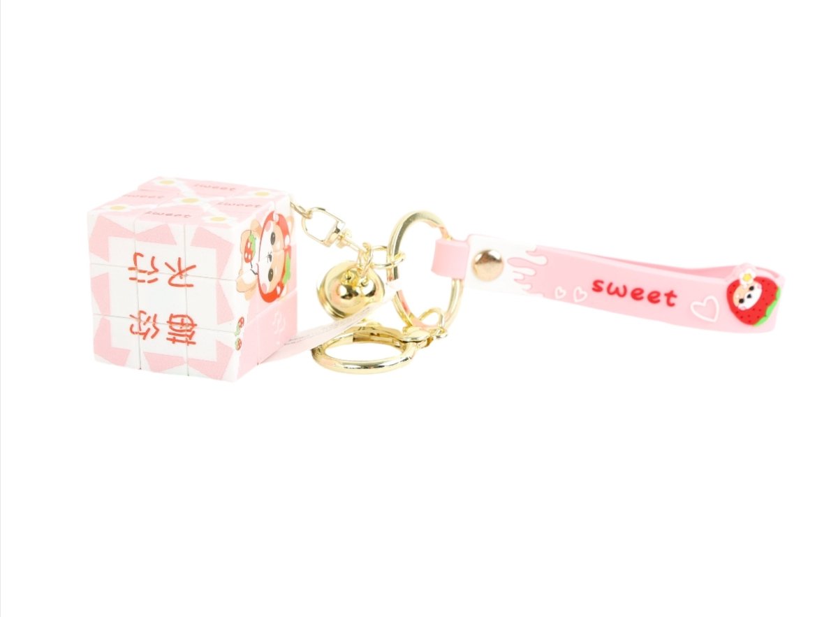 Tiger cube keychain with pink cube and pink ribbon strap, gold rings and clasp