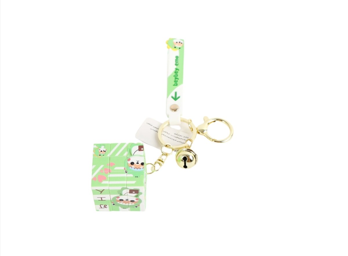 Green tiger-print cube keychain with gold keyring and bell charm