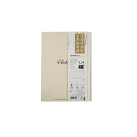 Hardback notebook back cover with product label and barcode, beige paper