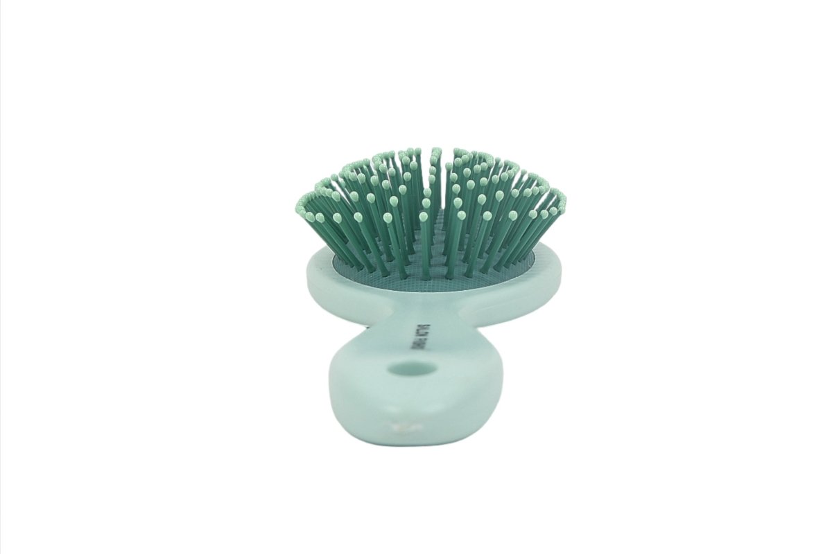 Hair brush for scalp massage, light green oval head with plastic pins and mint base