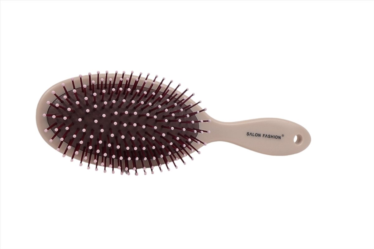 Hair brush for scalp massage with dark maroon bristles and beige handle