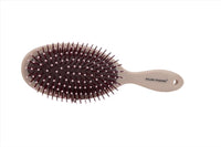 Hair brush for scalp massage with dark maroon bristles and beige handle