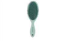 Hair brush for scalp massage, green oval head with plastic pins and mint handle
