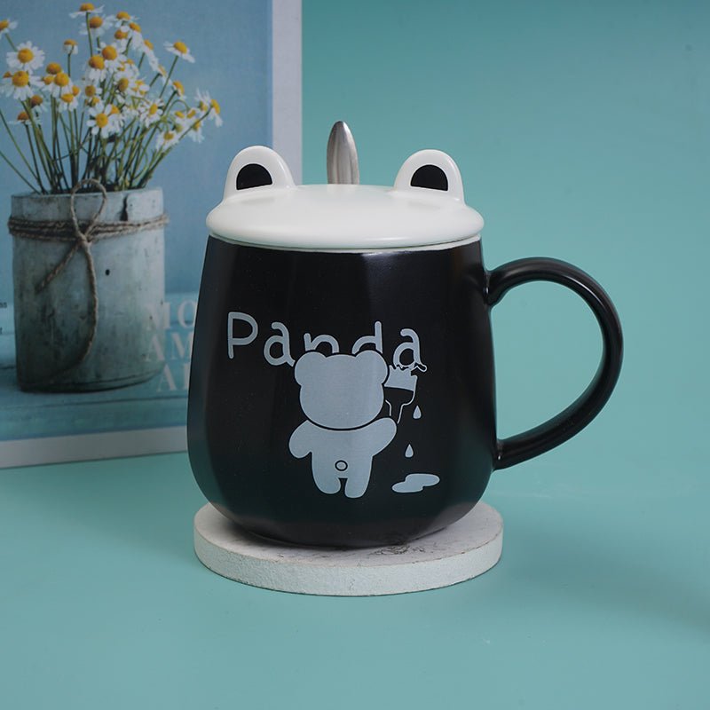 Black ceramic panda cup with lid and spoon, 'Panda' graphic on front