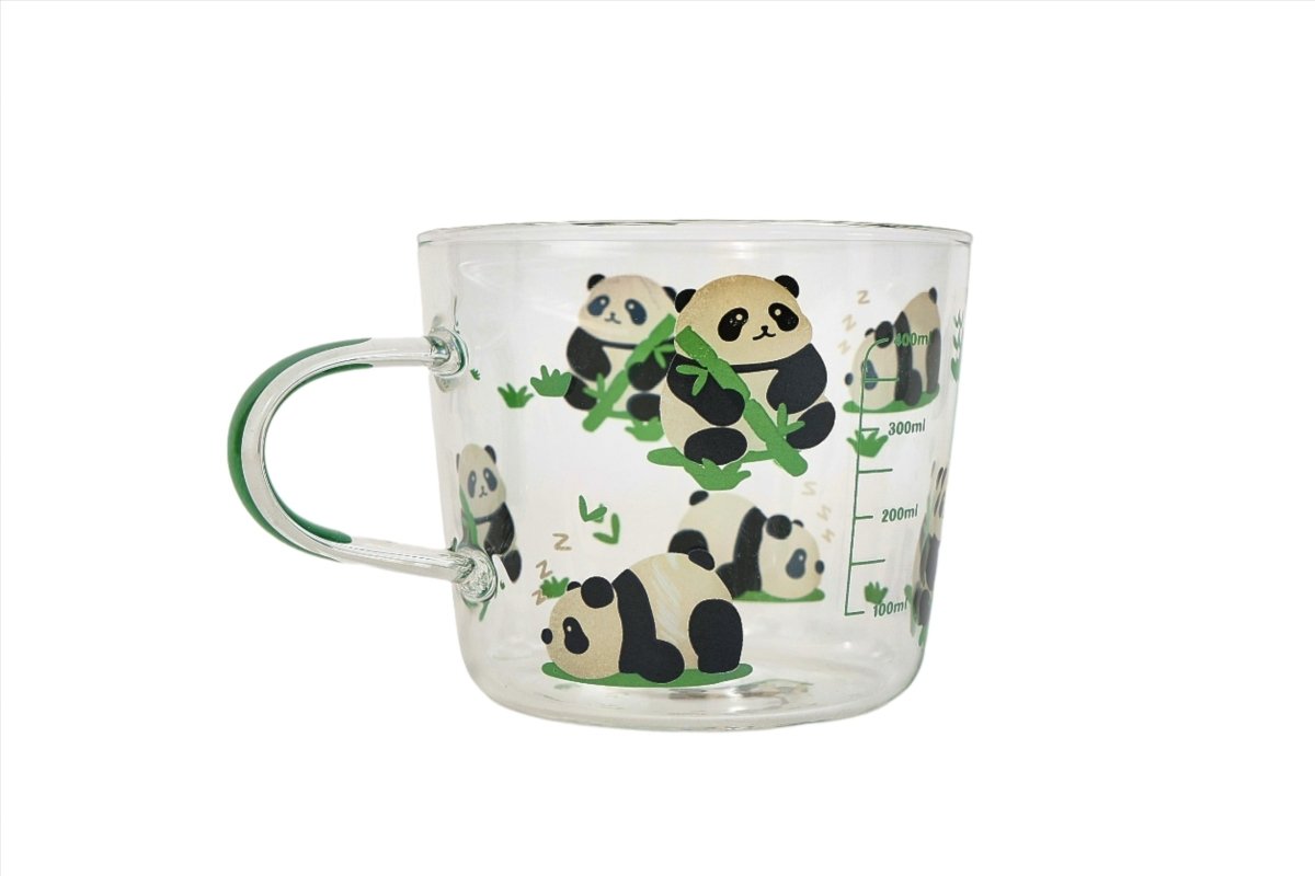 Glass mug with panda faces and bamboo graphic, clear body and side handle