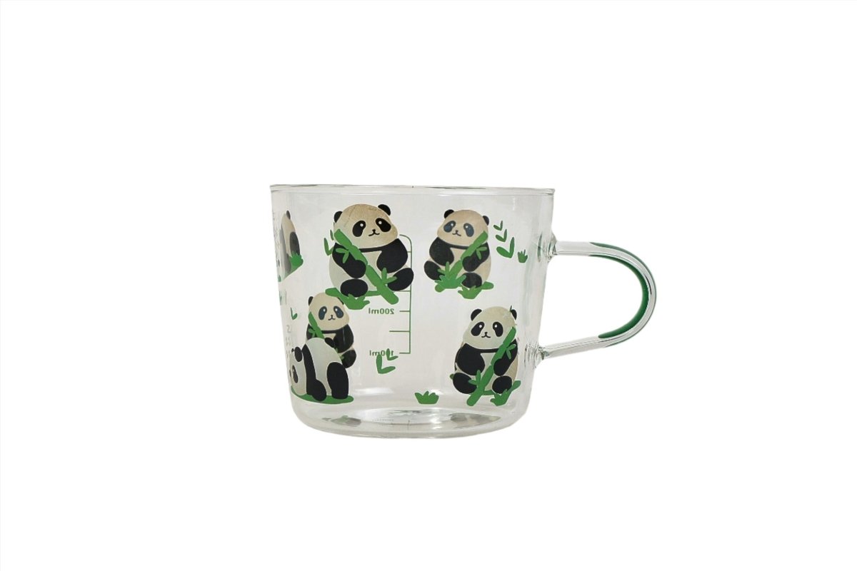 Clear glass mug with scattered panda-and-bamboo print and loop handle