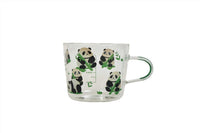 Clear glass mug with scattered panda-and-bamboo print and loop handle