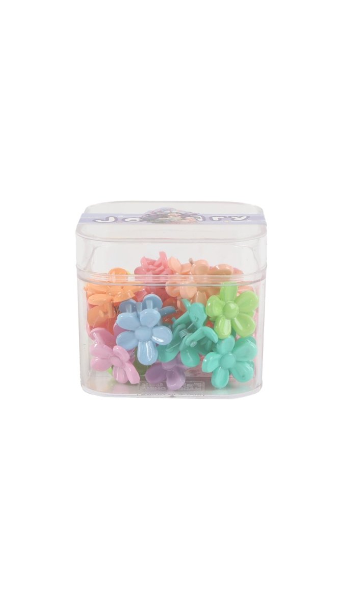 Flower-shaped hair clips in assorted pastel colors in clear storage jar