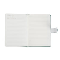Open pastel notebook pages with lined writing area and gray magnetic strap, green cover