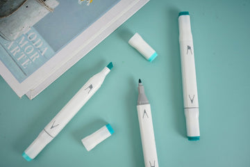 Peppermint highlighter set of 3, white pens with teal tips and caps, chisel ends