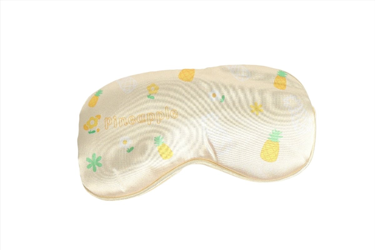 Silk sleep eye mask, cream with pineapple pattern, stitched with gathered center