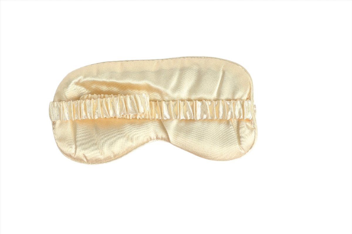 Silk sleep eye mask, cream satin with ruched elastic band across top
