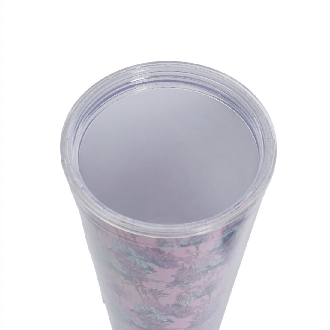 Pink floral tumbler top with clear lid rim and drinking opening